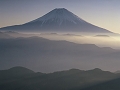 斜光に煙る